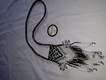 Kalung manik tali tenun