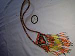 Kalung manik tali tenun