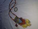 Kalung manik tali tenun