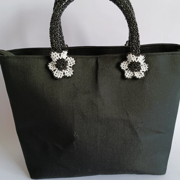 Tas jinjin manik