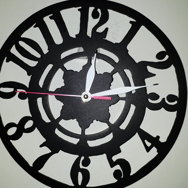 Jam dinding ukiran pipa paralon