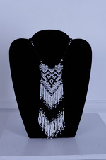 Kalung manik motif dayak